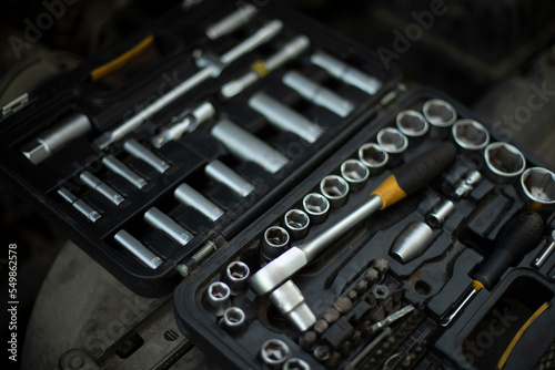 Tool in drawer. Car repairs. Wrenches and nuts. Steel tool kit.