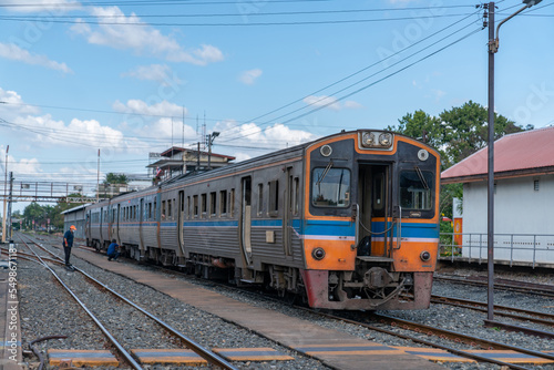 Technicial railway under checking engine and railway work.