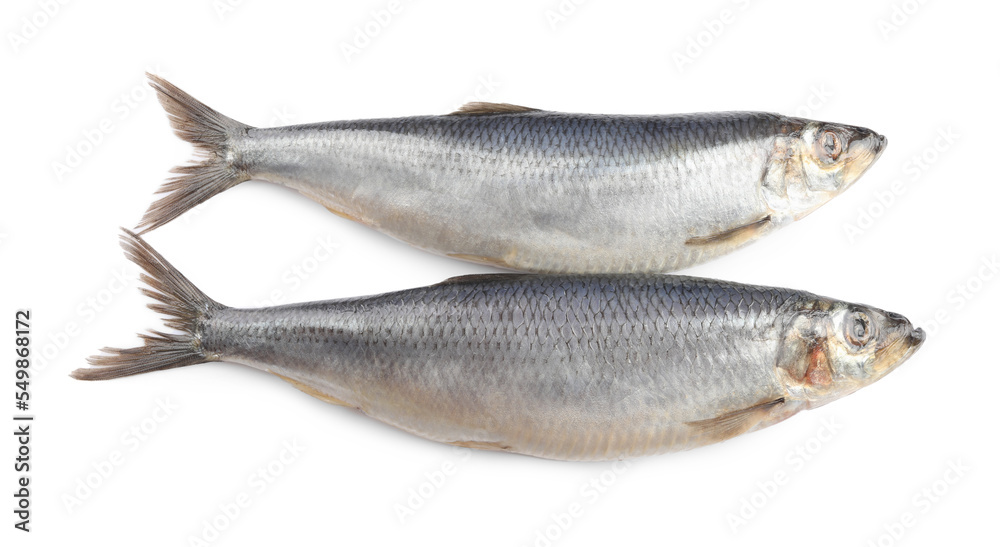 Whole delicious salted herrings isolated on white, top view Whole delicious salted herrings isolated on white, top view