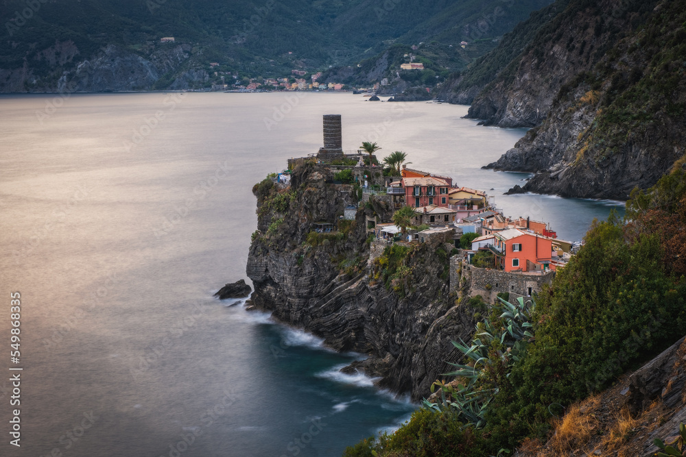 Vernazza, Cinque Terre, Liguria, Italy - September 2022: A golden sunset in Vernazza. Long exposure picture.