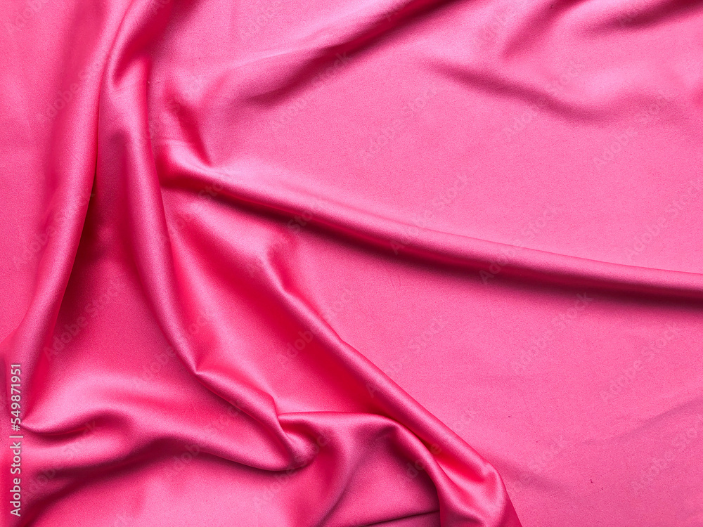 Soft silk textile texture for background. Abstract pink fabric for poster, banner, wallpaper and creative project. Soft silk textile texture for background. Abstract pink fabric for poster, banner, wallpaper and creative project.