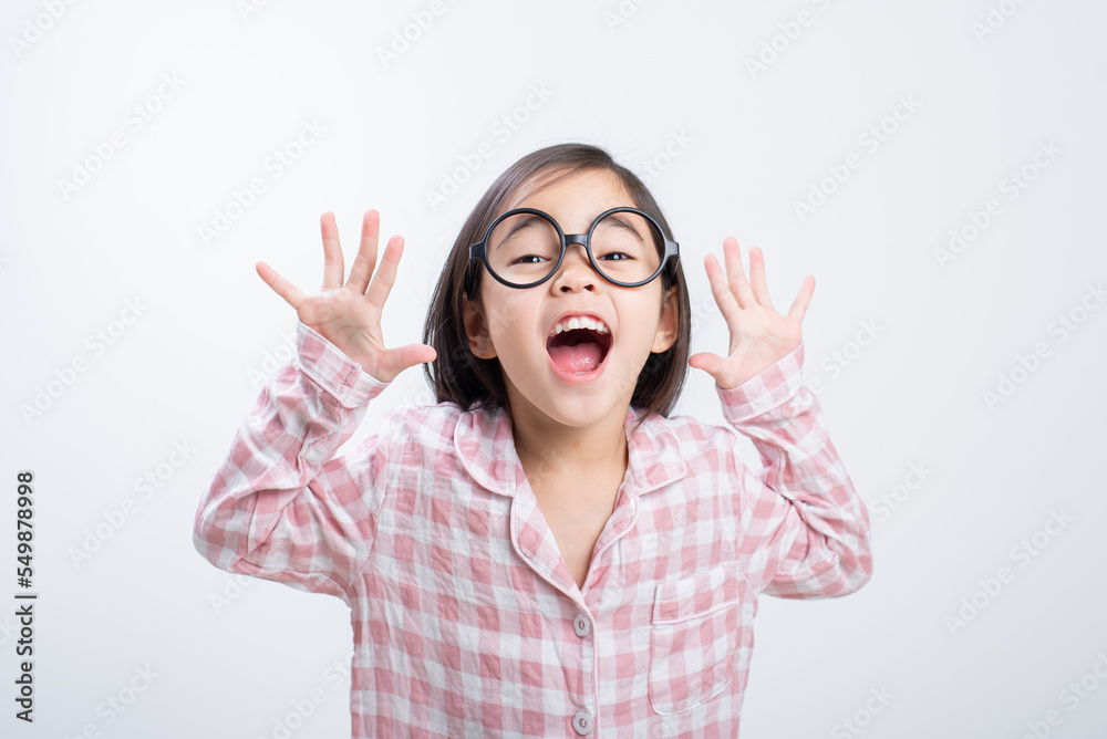 little girl asian wearing glasses, pink shirt, white background little girl asian wearing glasses, pink shirt, white background