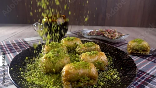 Baklava, famous Turkish dessert, with pistachio and sugar sherbet photo