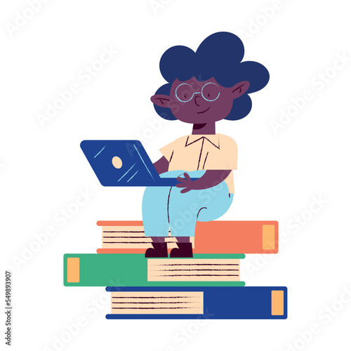 young schoolboy using laptop