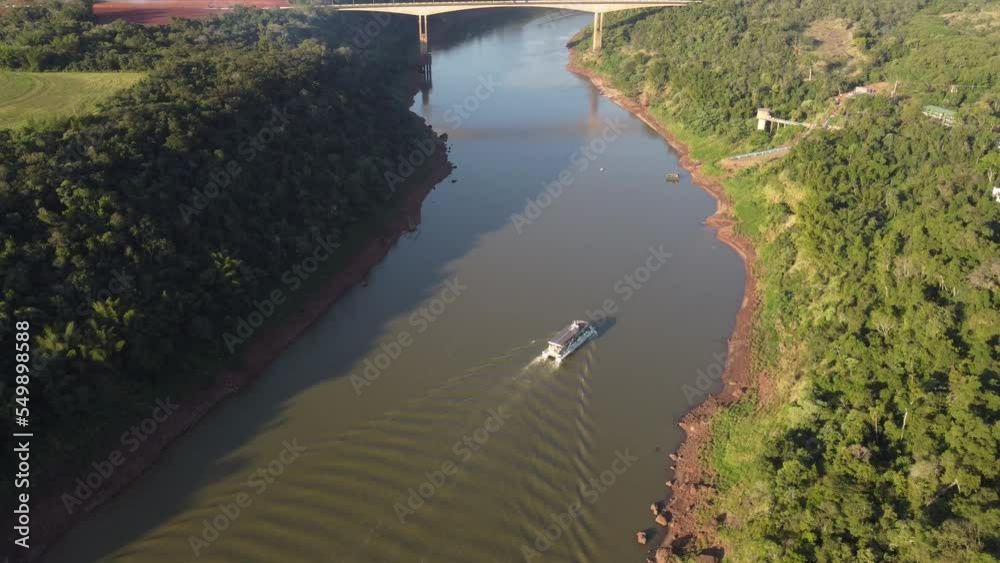 aerial view of a tourist boat sailing on the Iguazu River aerial view of a tourist boat sailing on the Iguazu River