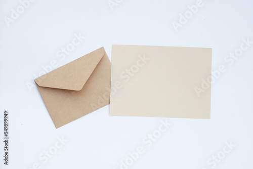 Brown paper and envelopes on white background. © Bowonpat