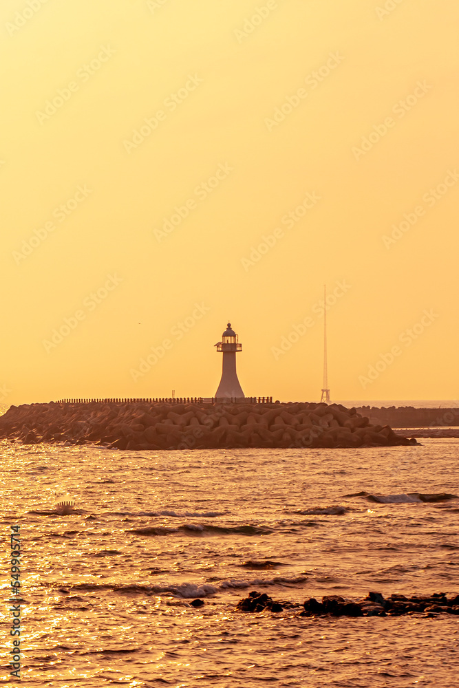 The ocean view with red lighthouse in Jeju island