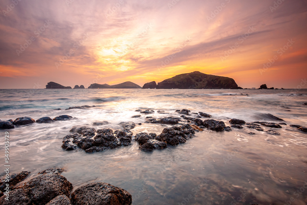 Landscape with Chagwido Island and strange volcanic rocks, view from Olle 12 corse in Jeju Island, Korea. Landscape with Chagwido Island and strange volcanic rocks, view from Olle 12 corse in Jeju Island, Korea.