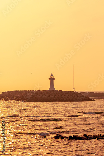 The ocean view with red lighthouse in Jeju island