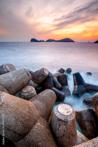 Landscape with Chagwido Island and strange volcanic rocks, view from Olle 12 corse in Jeju Island, Korea. photo