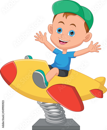 cute boy playing spring airplane seesaw