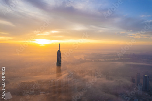 aerial view of Ho Chi Minh City in the morning, Top view aerial photo from flying drone of a Ho Chi Minh City with development buildings, transportation, energy power infrastructure.