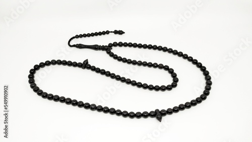 Mate black onyx prayer beads tasbih on a white background 