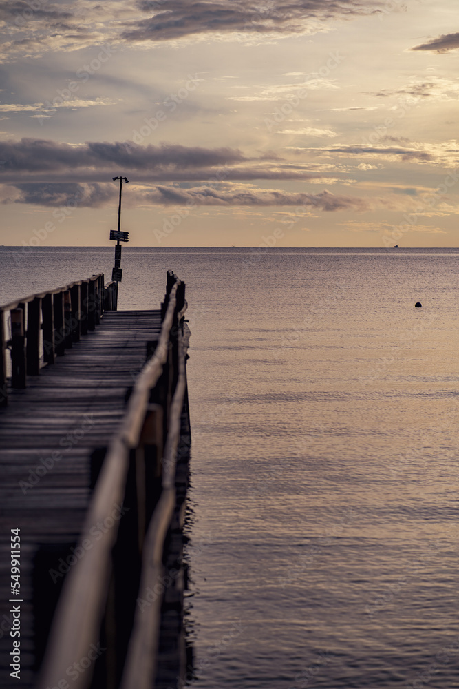 Fototapeta premium pier in the sea sunrise 
