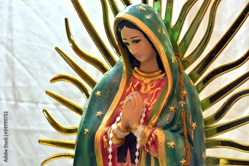 Принти на полотні Altar to of Our Lady of Guadalupe with candles, mexican colors and flowers ready