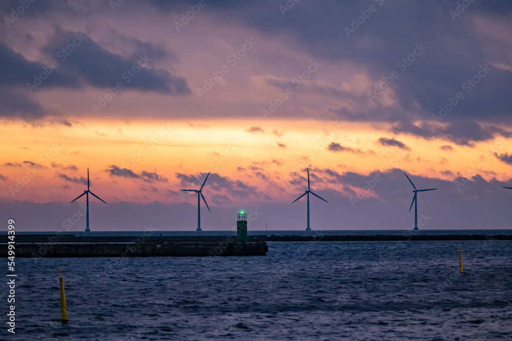 Copenhagen, Denmark Wind turbines at sea seen from the Nordhavn district.
