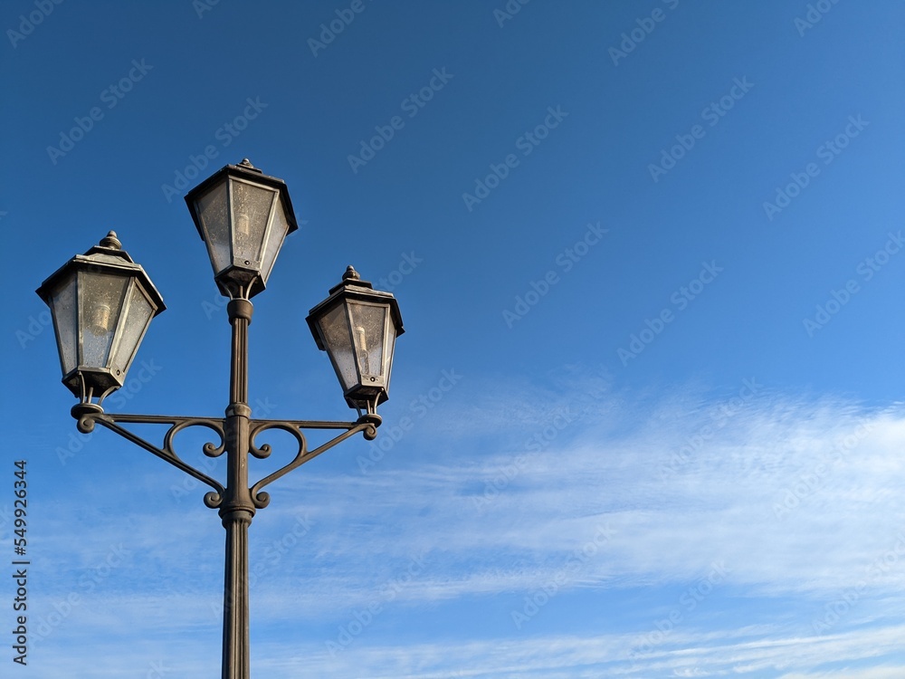 lantern against the blue sky
