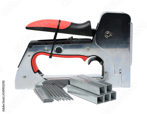 Household manual stapler and staples on a white background