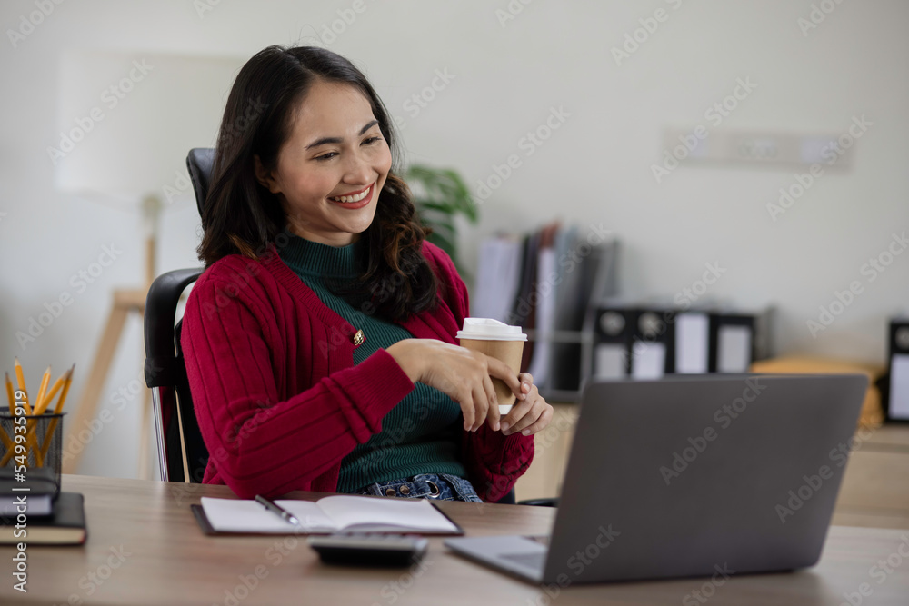 Happy smiling woman working at table office, Working woman concept.