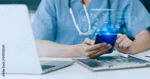Medicine doctor using digital healthcare and network connection on hologram modern virtual screen interface icons  Medical technology futuristic concept.