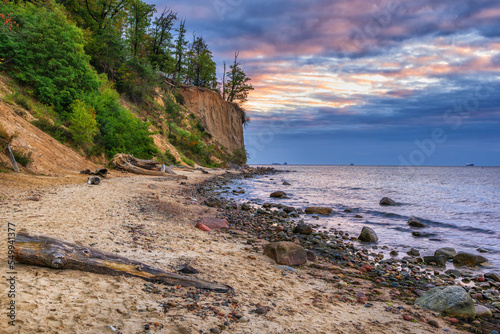 Baltic Sea Beach And Cliff At Dawn In Gdynia Orlowo, Poland photo