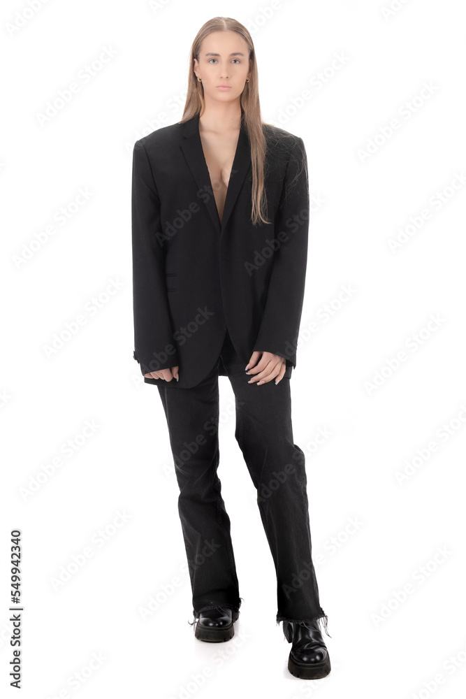 Blonde model in a men's jacket. Beautiful woman with long hair Blonde model in a men's jacket. Beautiful woman with long hair