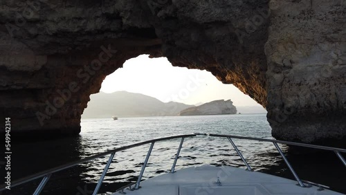 Boat through the arch into the Cave