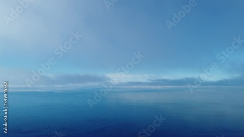 Wallpaper Mural Fog over sea. Abstract aerial nature summer ocean sunset sea and sky background. Small waves on clear water surface with bokeh lights from sunrise. Holiday, vacation and recreational concept Torontodigital.ca