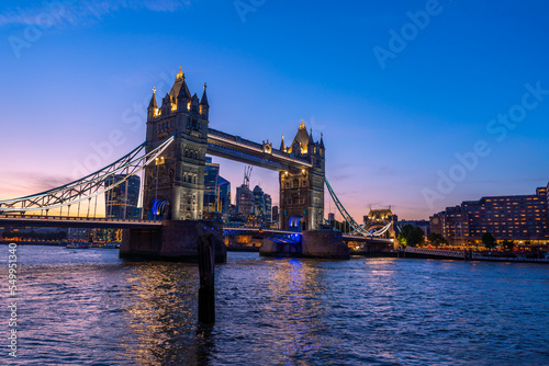 View of the famous Tower Bridge and skyline of London  UK  during beautiful sunset time in summer