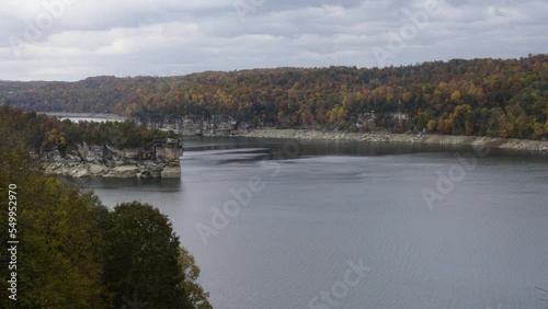 Static shot of the River Gorge tranquility flowing through the landscape with vibrant trees photo