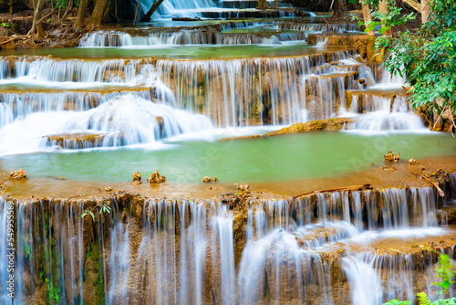 Amazing colorful waterfall in national park forest during spring,beautiful deep forest in Thailand,technic long exposure, during vacation and relax time.