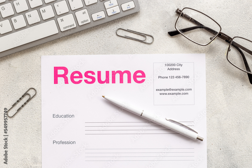 We are hiring. Resume application on HR manager office desk We are hiring. Resume application on HR manager office desk