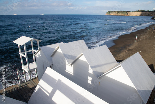 white  empty beach huts in Procida © Melinda Nagy