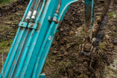 Close up of excavator or digger digging some a soil or clay  industrial concept