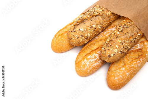 Assortment of baked bread baguette isolated on white background