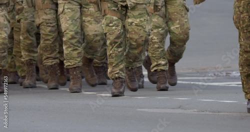 4K - A column of nato soldiers on a march photo