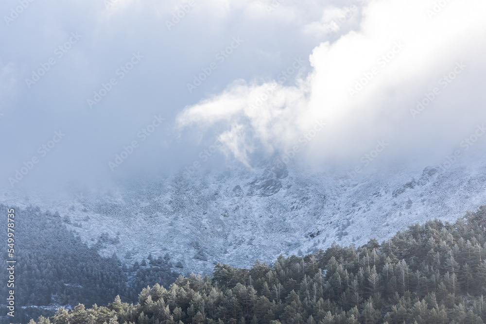Slightly snowy landscape with the first snowfall in the Sierra de Guadarrama in Madrid