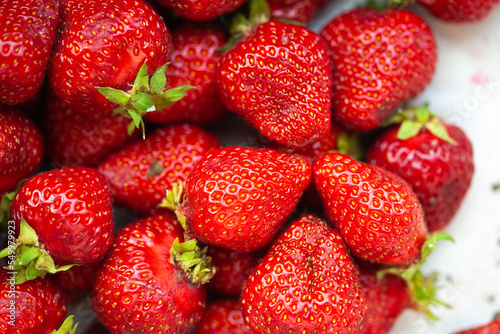 background from freshly harvested ripe strawberries, directly above