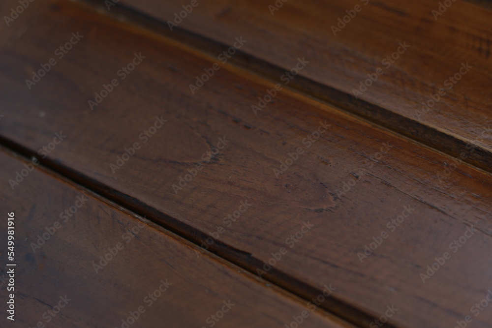 a close up of decorative detail on a wooden chair