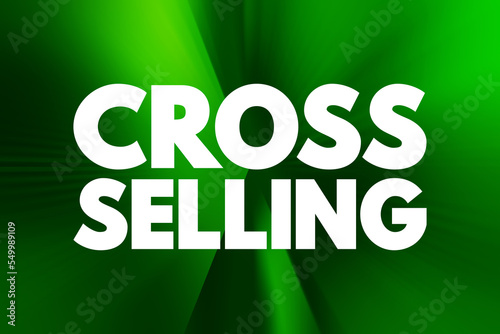 Cross Selling - action or practice of selling an additional product or service to an existing customer, text quote background photo