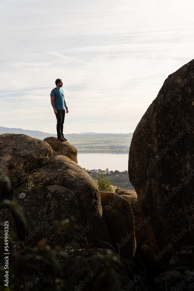 Man on rock in the mountain