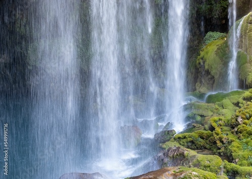 Closeup of the Yerkopru Waterfall flowing from the high cliffs in Turkey photo