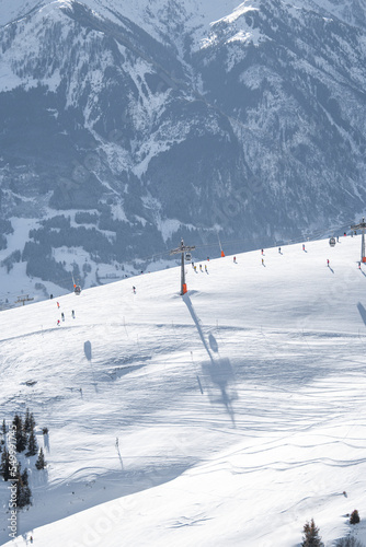 High quality photos of cable car on Austrian mountain. Images of ski slopes with gondola with white snow.  © Chris