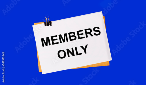 On a bright blue background, an envelope and a sheet of paper with the text MEMBERS ONLY under the paper clip.