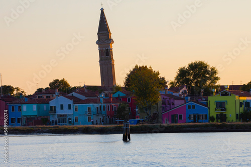 Island murano in Venice Italy. View on canal with boat and motorboat water. 
