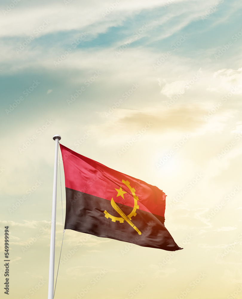 Waving Flag of Angola with beautiful Sky. 