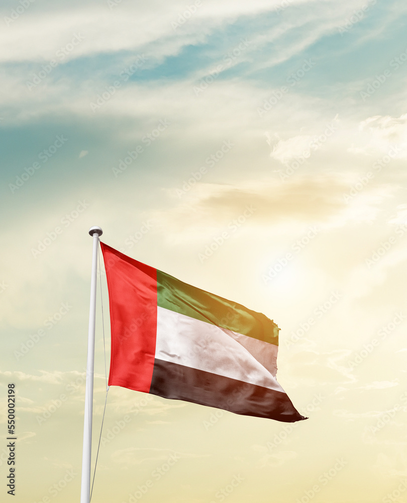 Waving Flag of United Arab Emirates with beautiful Sky. 
