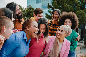 Young multiracial group of people having fun outdoor - Focus on arabian girl face