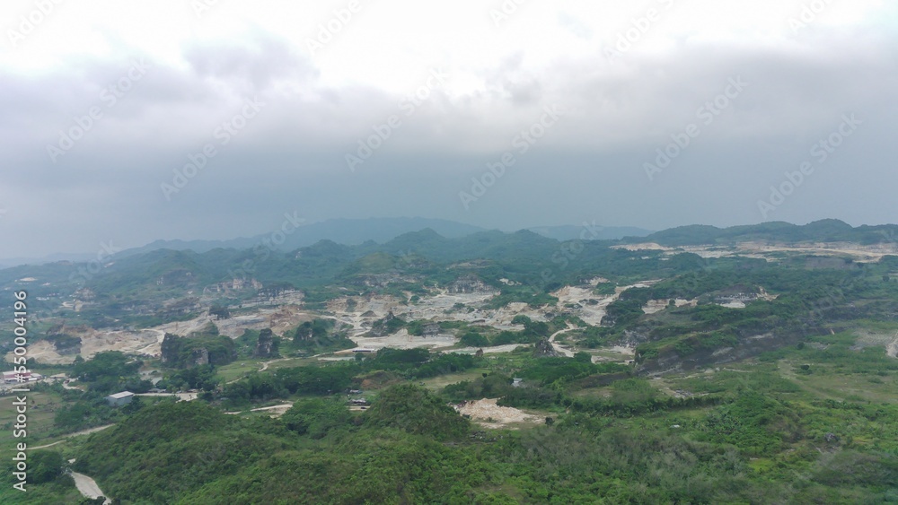 aerial view of limestone mountain as a mining site.