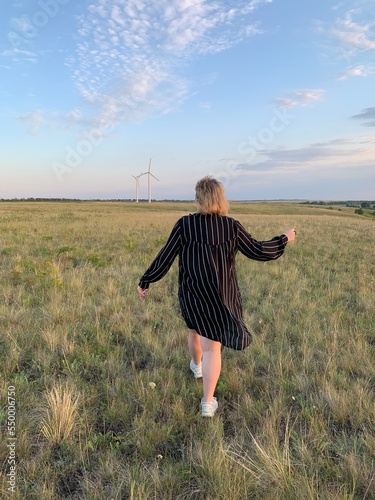 person walking in the field